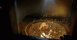 Scrooge McDuck Sitting On Gold Coins GIF