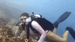 Scuba Diving Woman Blow Kisses GIF