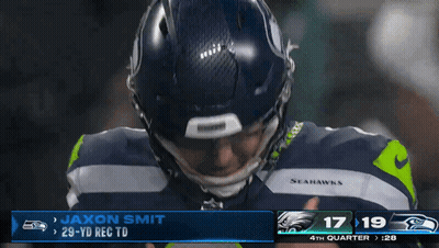 Seahawks Player Jaxon Smith In Front Of Scoreboard GIF