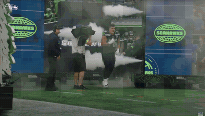 Seahawks Player Walking On Field GIF