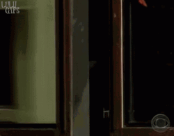 Secret Santa Holding Many Gifts GIF