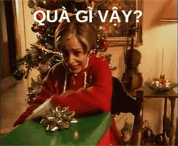 Secret Santa Woman Excited Opening Gift GIF