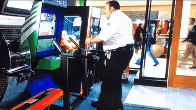 Security Guard By Arcade Machine Saying Arcade GIF