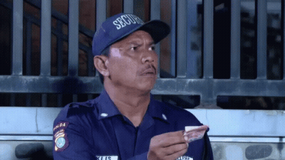 Security Guard Holding Money GIF