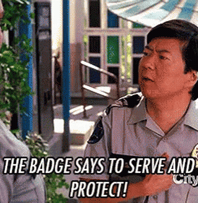 Security Guard Looking At Cell Phone GIF