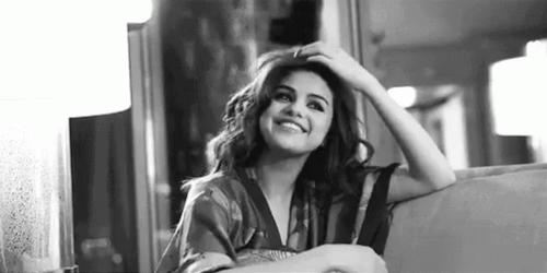 Selena Gomez Demure Smile GIF