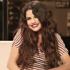 Selena Gomez Happy And Flattered GIF