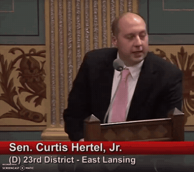 Sen Curtis Hertel Jr. Giving Speech At Podium GIF