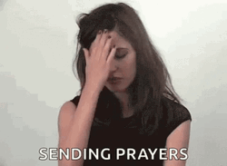 Sending Prayers Rose Byrne Sign Of The Cross GIF
