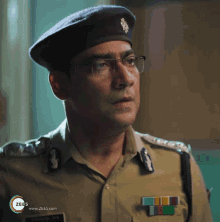 Senior Asian Police Office Salute GIF