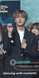 Seok Jin Playing Confetti GIF