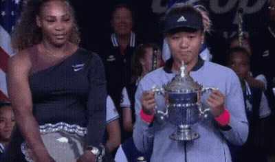 Serena Williams And Naomi Osaka Holding Trophy GIF