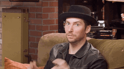 Serious Air Quotes GIF