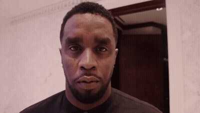 Serious Bearded Man Looking At Camera GIF
