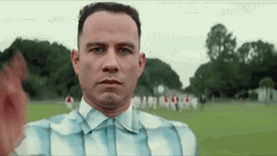 Serious John Travolta Running GIF