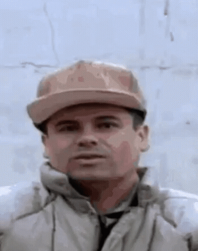 Serious Man In Hat And Jacket GIF