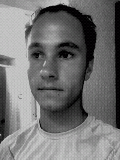 Serious Man In White Shirt GIF