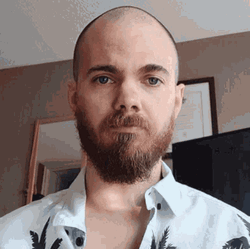 Serious Man Playing Smallest Violin GIF