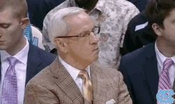 Serious Roy Williams Watching His Team GIF