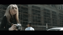 Serious Sabrina Carpenter Taking A Photo GIF