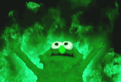 Sesame Street Character Surrounded By Green Flames GIF