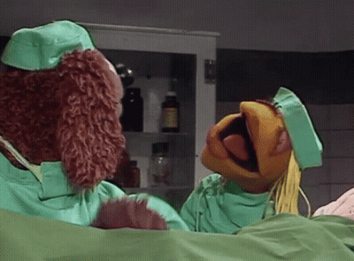 Sesame Street Characters In Green Scrubs Talking GIF
