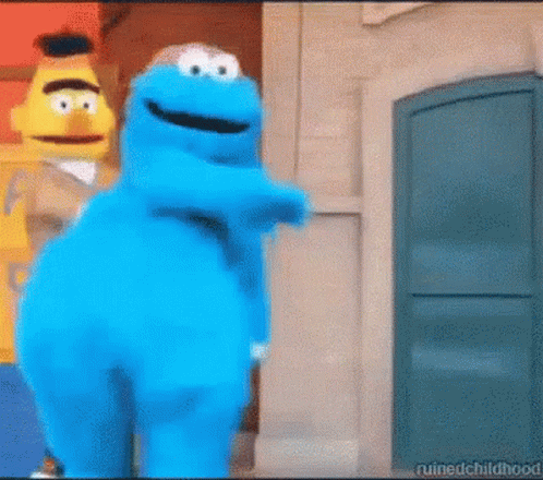Sesame Street Characters Next To Building GIF