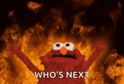Sesame Street Elmo In Front Of Fire Saying Who's Next GIF