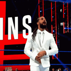 Seth Rollins In A White Suit GIF