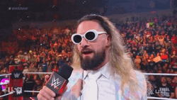 Seth Rollins Shades Down On An Interview GIF