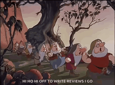 Seven Dwarfs Standing Under Tree In Woods GIF