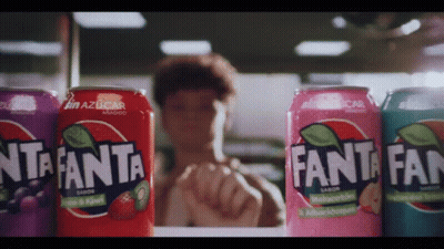 Several Cans Of Fanta Lined Up GIF