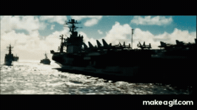 Several Military Ships Floating in Ocean