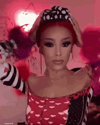  Sexy Doja Cat Fixing Red Hair GIF