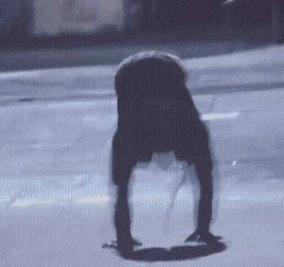 Shadow Of Person On Sidewalk GIF