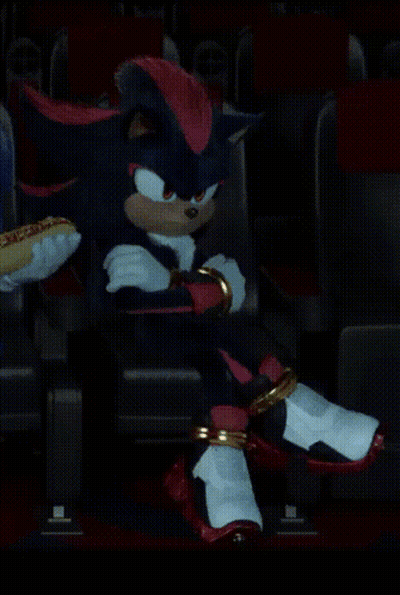 Shadow The Hedgehog Sitting In Dark Room With Hot Dog GIF