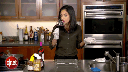 Sharon Profis Pouring Wine Onto Apple Watch GIF