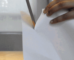 Sharp Knife Cutting Bond Paper