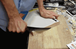 Sharp Knife Cutting Thick Book
