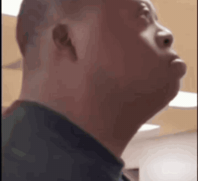 Shaved Head Man Looking Up GIF