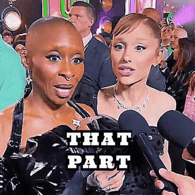 Shaved Head Woman Talking Into Microphone GIF