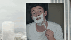 Shawn Mendes Shaving In Front Of Mirror GIF