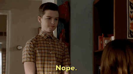 Sheldon Cooper Shrugs GIF