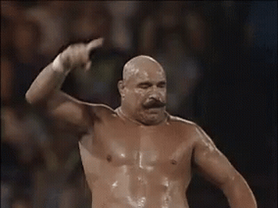 Shirtless Bald Man With Mustache In Wrestling Ring GIF