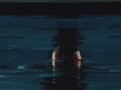 Shirtless Bearded Man Standing In Water GIF
