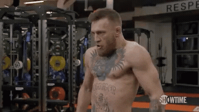 Shirtless Boxer Standing In Gym GIF