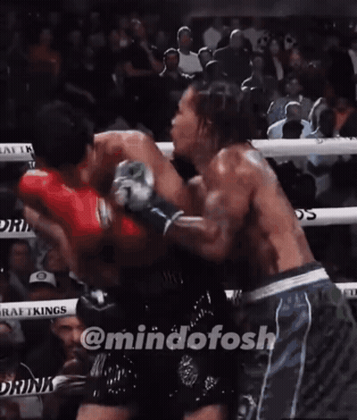 Shirtless Boxer With Crown Next To Another Boxer GIF