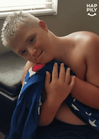 Shirtless Boy Holding Blue And White Blanket Hap Pily GIF