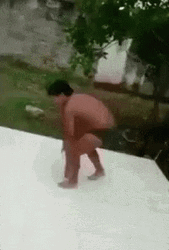 Shirtless Boy Slide While Dabbing GIF