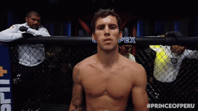Shirtless Fighter In Cage With Prince Of Peru Hashtag GIF